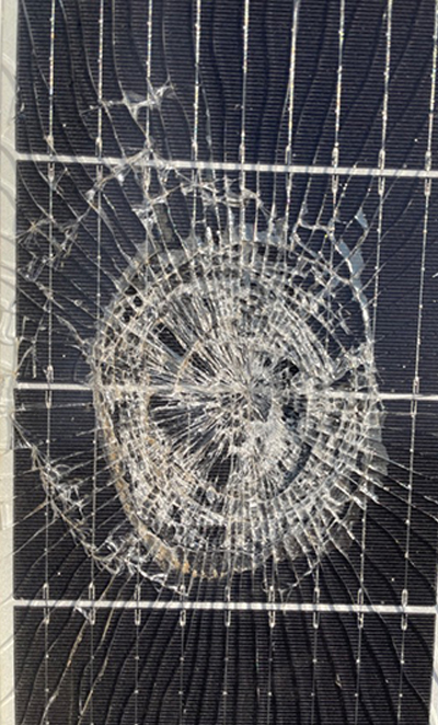 shattered glass of solar panel caused by hail